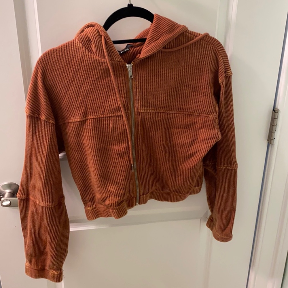Cropped burnt orange jacket. New condition.